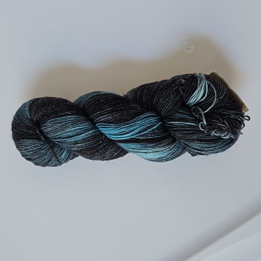 1 skein of Forbidden Fiber in Black Widow